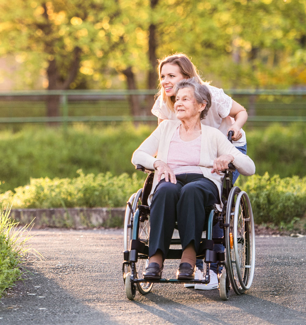 Daughter-with-elder-mom-on-walking-paths